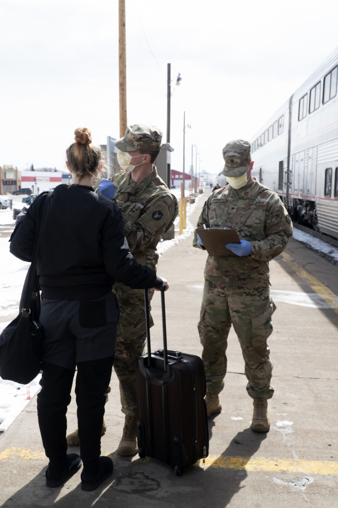 Montana Guard troops screen passengers